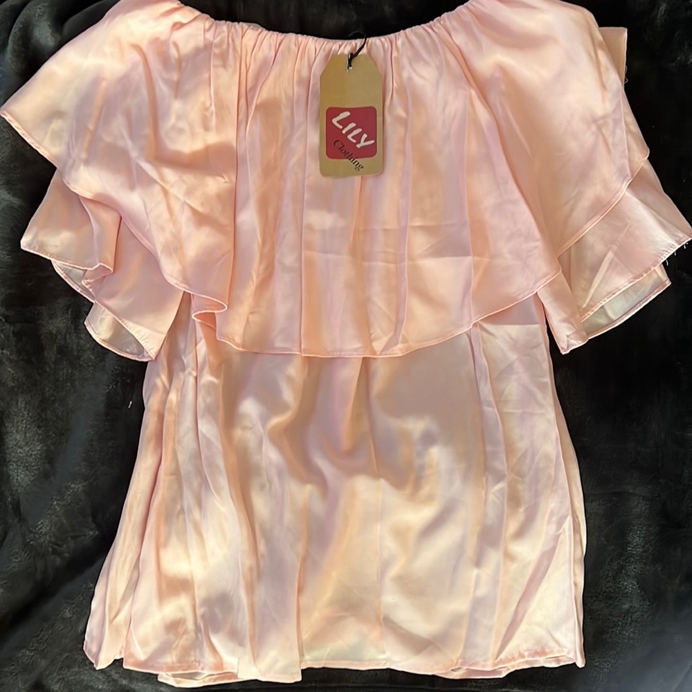 Light pink, ruffle, off the should top, brand new with tags.